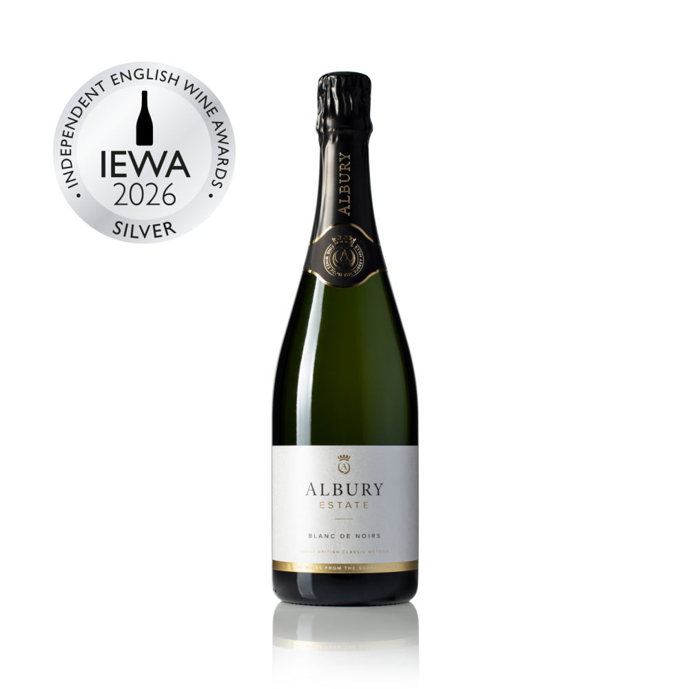 A bottle of Albury Estate Blanc de Noirs sparkling wine with a silver IEWA 2026 Silver award badge overlay on the top left, set against a solid white background.